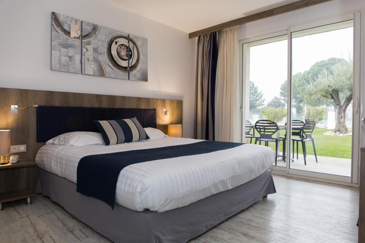Le Domaine Des Oliviers Hotel Pierrelatte ภายนอก รูปภาพ